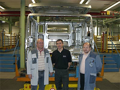 Discussion participants Jean Claude Saeul (MAN Nutzfahrzeuge), Roland Kinzel (GDV Systems), and Johann Dumele (MAN Nutzfahrzeuge).